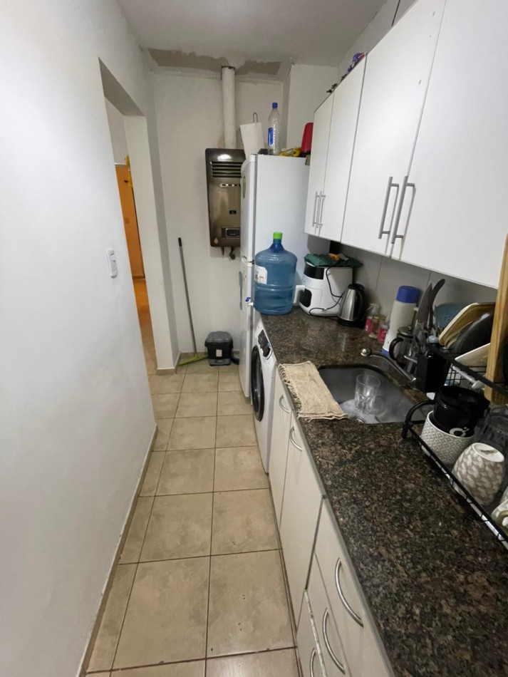 Venta de depto de un dormitorio en planta baja con patio y cocina separada , con escritura en barrio pueyyredon 