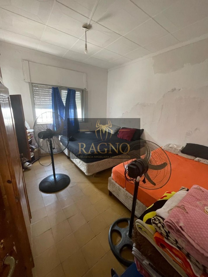 Casa de dos dormitorios con cochera y patio con escritura en barrio talleres sud zona libertad sabatini